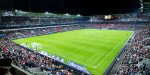 Norway National Football team plays under Musco FIFA Quality Pro-Certified LED arena lighting at Ullevaal Stadium.