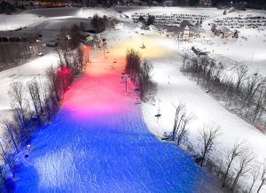 rgbw fixtures change the side of the mountain to blue, pink and orange at mt st louis moonstone